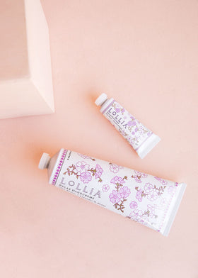 LOLLIA label and ingredients list highlighting botanical oils and butters