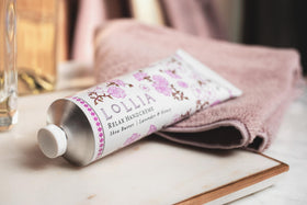 LOLLIA on bathroom vanity styled with lavender for a calming routine