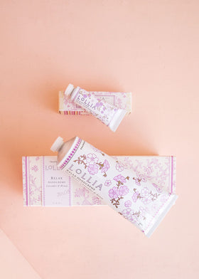 LOLLIA travel size in hand showing portable .33 oz for on-the-go hydration