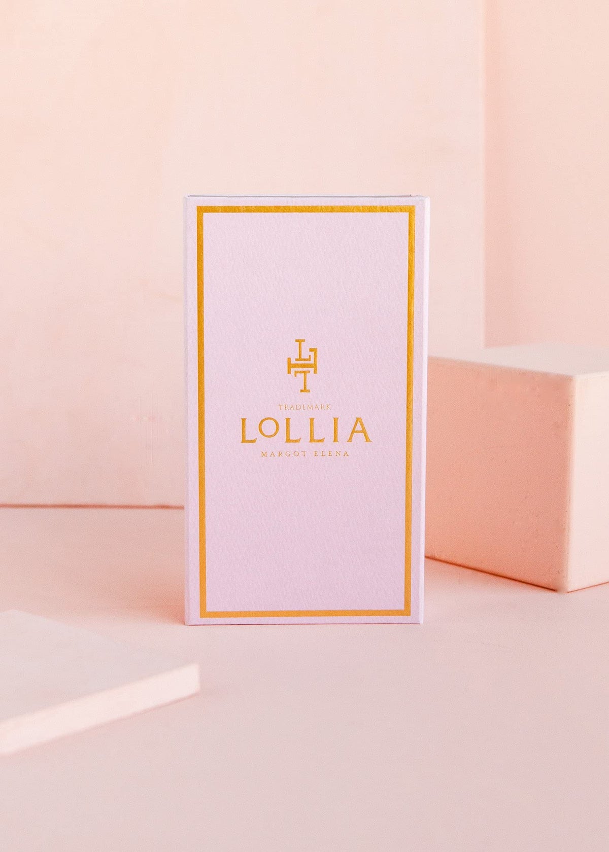 LOLLIA six tubes flatlay highlighting fragrance variety and compact sizes for travel-friendly convenience