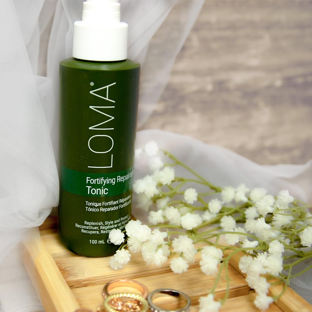 Loma label close-up listing creatine, keratin and cranberry pear aroma