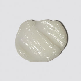 Loma conditioner cream texture swirled to show lightweight, non-greasy formula