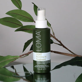 LOMA applied to hair ends in salon setting, improves smoothness and manageability