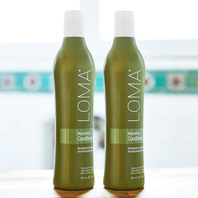 Loma nourishing conditioner bottle on shelf showing 12 ounce scale and compatibility