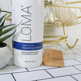LOMA shampoo in bathroom lifestyle scene showing bottle scale and everyday convenience