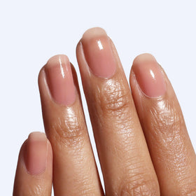 LONDONTOWN being applied to cuticle illustrating targeted nail repair