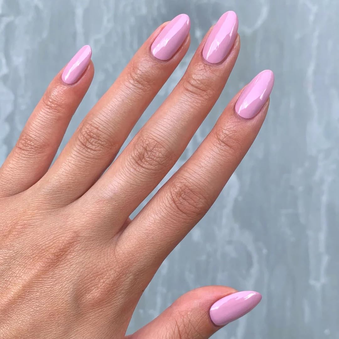 LONDONTOWN applying polish on nails demonstrating smooth even coats benefit