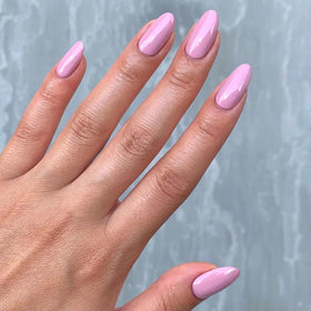 LONDONTOWN applying polish on nails demonstrating smooth even coats benefit