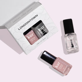 LONDONTOWN dusty rose swatch on nail tip demonstrating flattering sheer tint