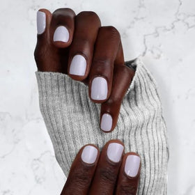 LONDONTOWN lifestyle scene on a tabletop conveying salon-quality home manicure