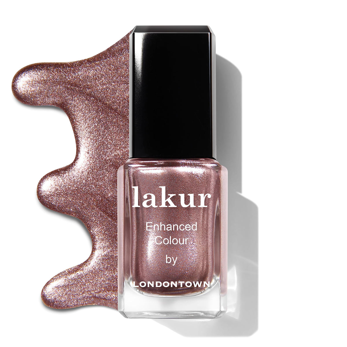 LONDONTOWN Lakur bottle beside a coin demonstrating compact 0.4 fl oz size