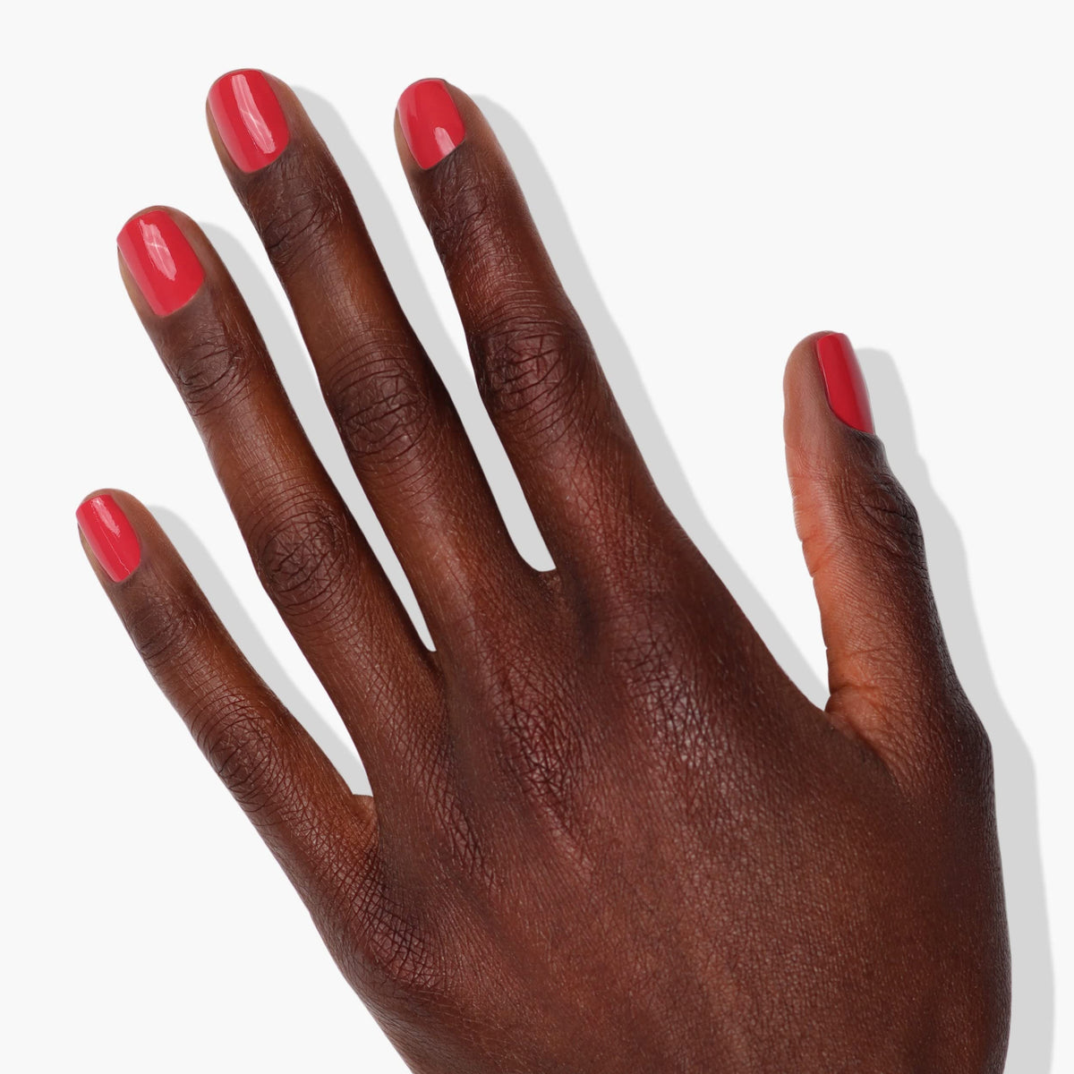 LONDONTOWN color swatches across nails illustrating vibrant streak-free coverage benefit
