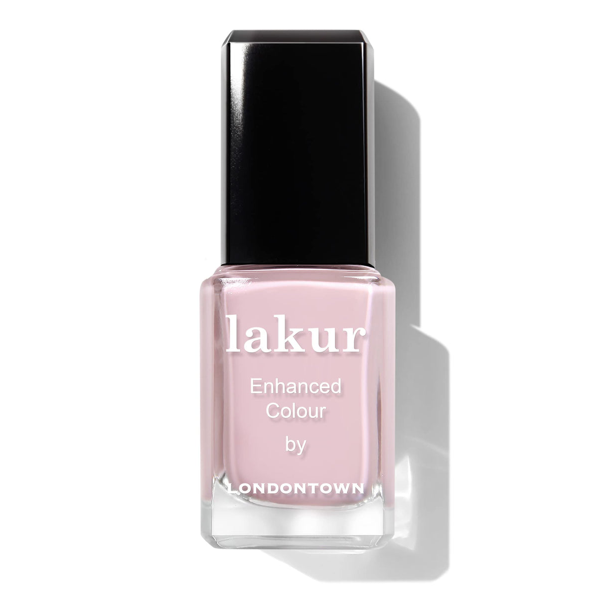 LONDONTOWN manicured hand holding coffee demonstrating wearable everyday polish