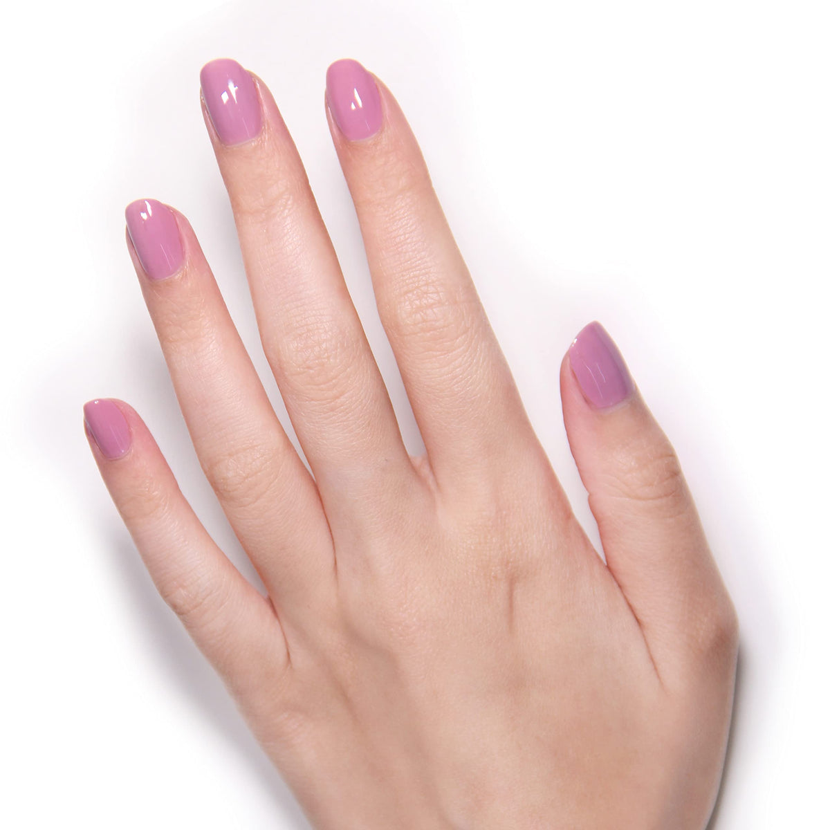 LONDONTOWN Lakur on nails in use showcasing glossy, chip-resistant finish