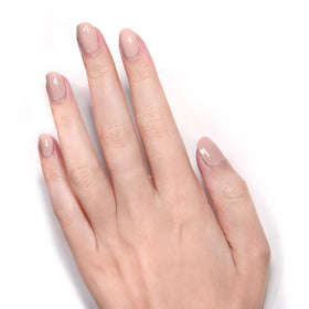 LONDONTOWN nails painted Café Au Lait in a lifestyle setting benefit: wearable neutral elegance