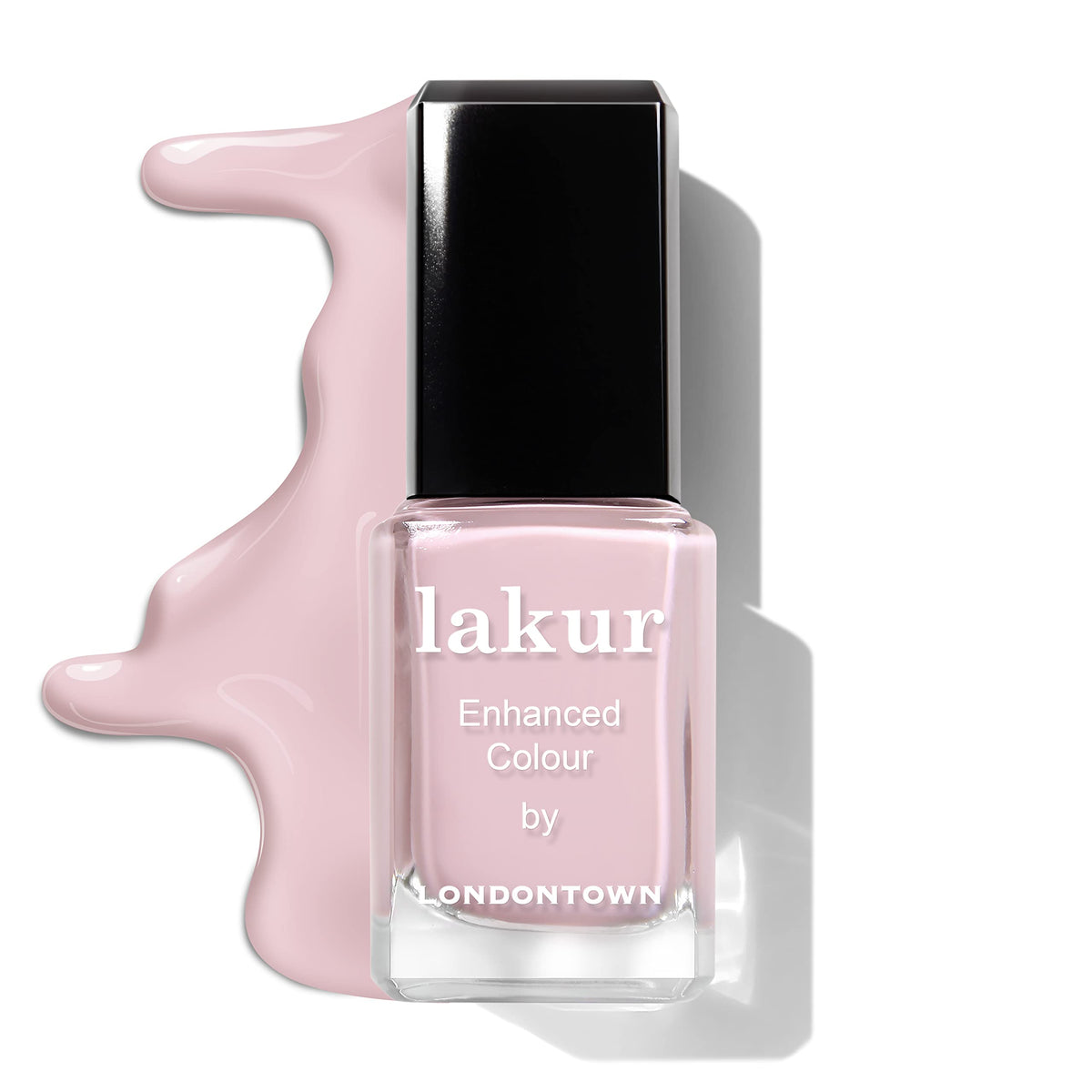 LONDONTOWN 0.4 fl oz bottle beside ruler showing compact salon-sized amount