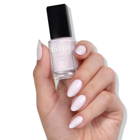 LONDONTOWN Lakur close-up of wet nail surface highlighting high shine