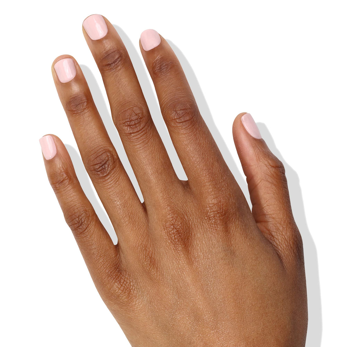 LONDONTOWN Lakur swatch on nails demonstrating rich color and chip resistance