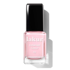 LONDONTOWN bottle on tabletop in lifestyle scene suggesting fashion-forward color