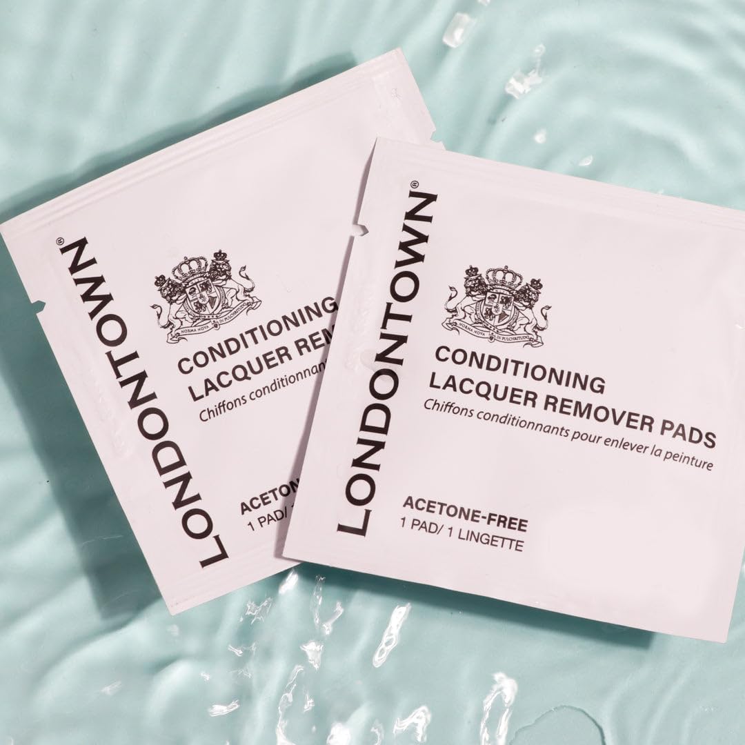 LONDONTOWN pads in a handbag lifestyle shot for on‑the‑go nail care convenience