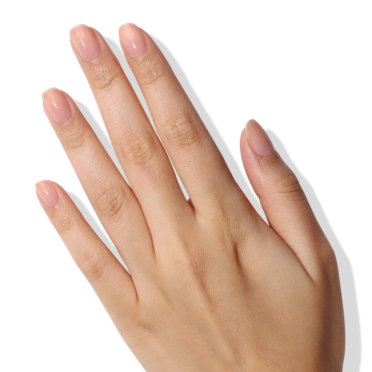 LONDONTOWN lifestyle hand shot with glossy manicure for polished look
