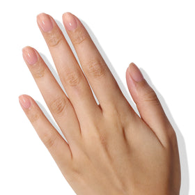 LONDONTOWN lifestyle hand shot with glossy manicure for polished look