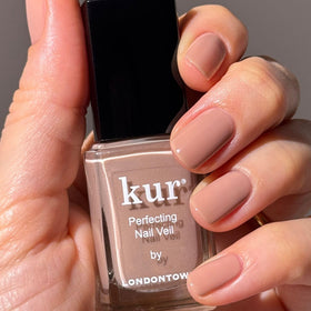 LONDONTOWN placed on bathroom vanity suggesting quick five-minute mani benefit: time-saving