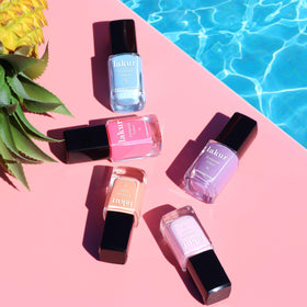 LONDONTOWN lifestyle flatlay with Pink Palm displaying polished look and routine