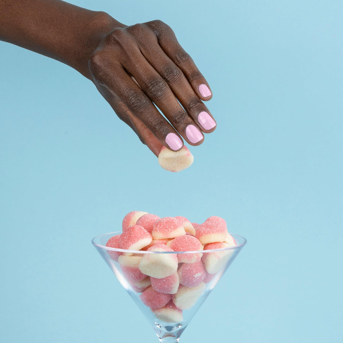 LONDONTOWN painted hands wearing Pink Palm showing chip-resistant finish