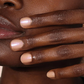 LONDONTOWN applied on nails in a lifestyle setting for effortless polish benefit