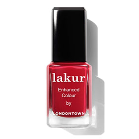 LONDONTOWN lifestyle shot of woman wearing Ring Me red for polished look