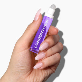 LONDONTOWN rollerball closeup highlighting smooth applicator for precise, mess-free use