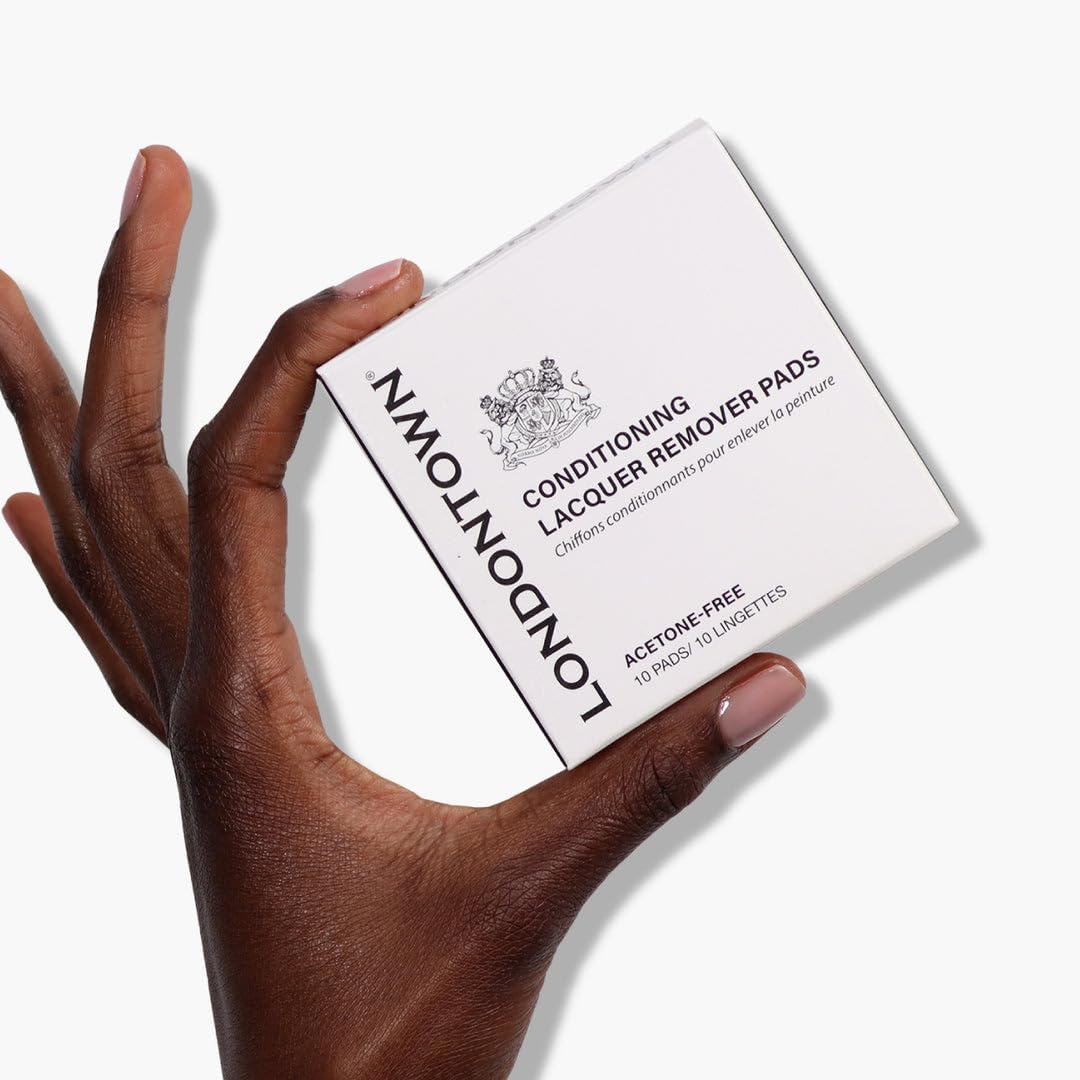 LONDONTOWN pad next to ruler for size comparison and portability advantage