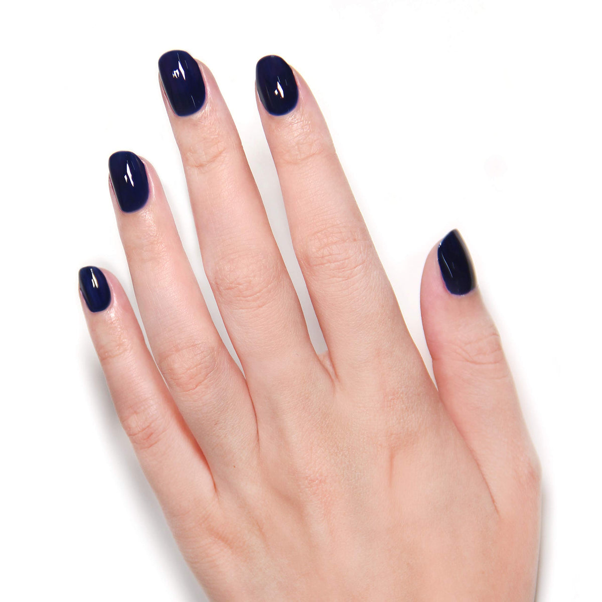 LONDONTOWN swatch on natural nails showing true Buckingham Blue payoff and coverage