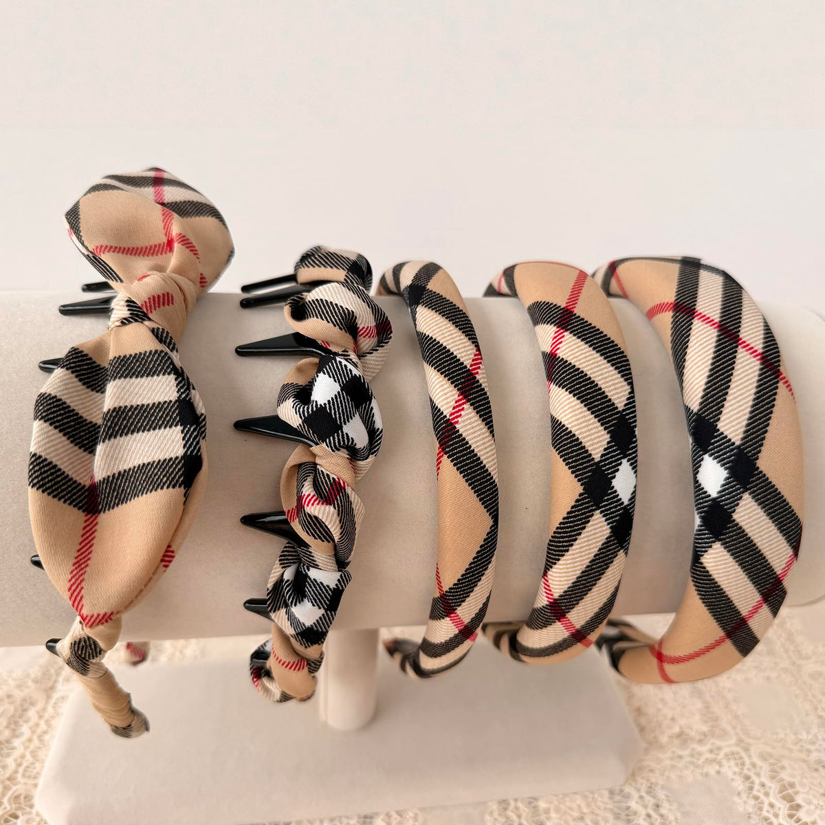 LONEEDY front view of five plaid headbands showing variety and coordinated styling benefit