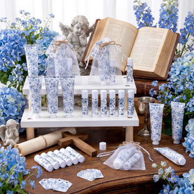 Loopeer favor set styled on guest table enhancing wedding decor