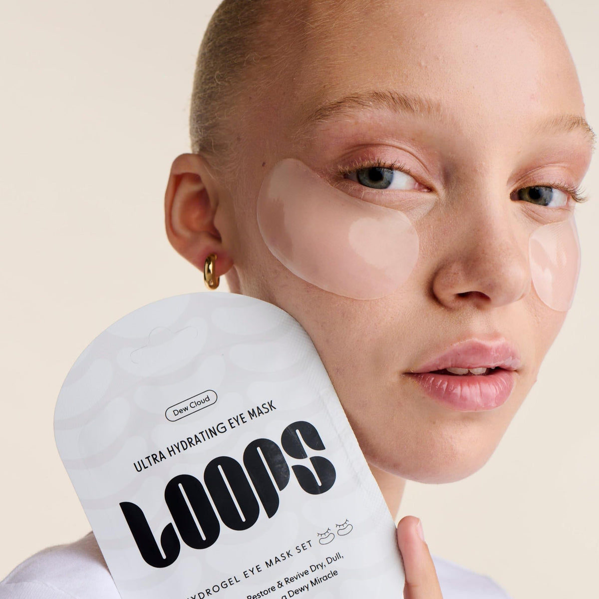 LOOPS mask applied under eye demonstrating immediate refreshing effect