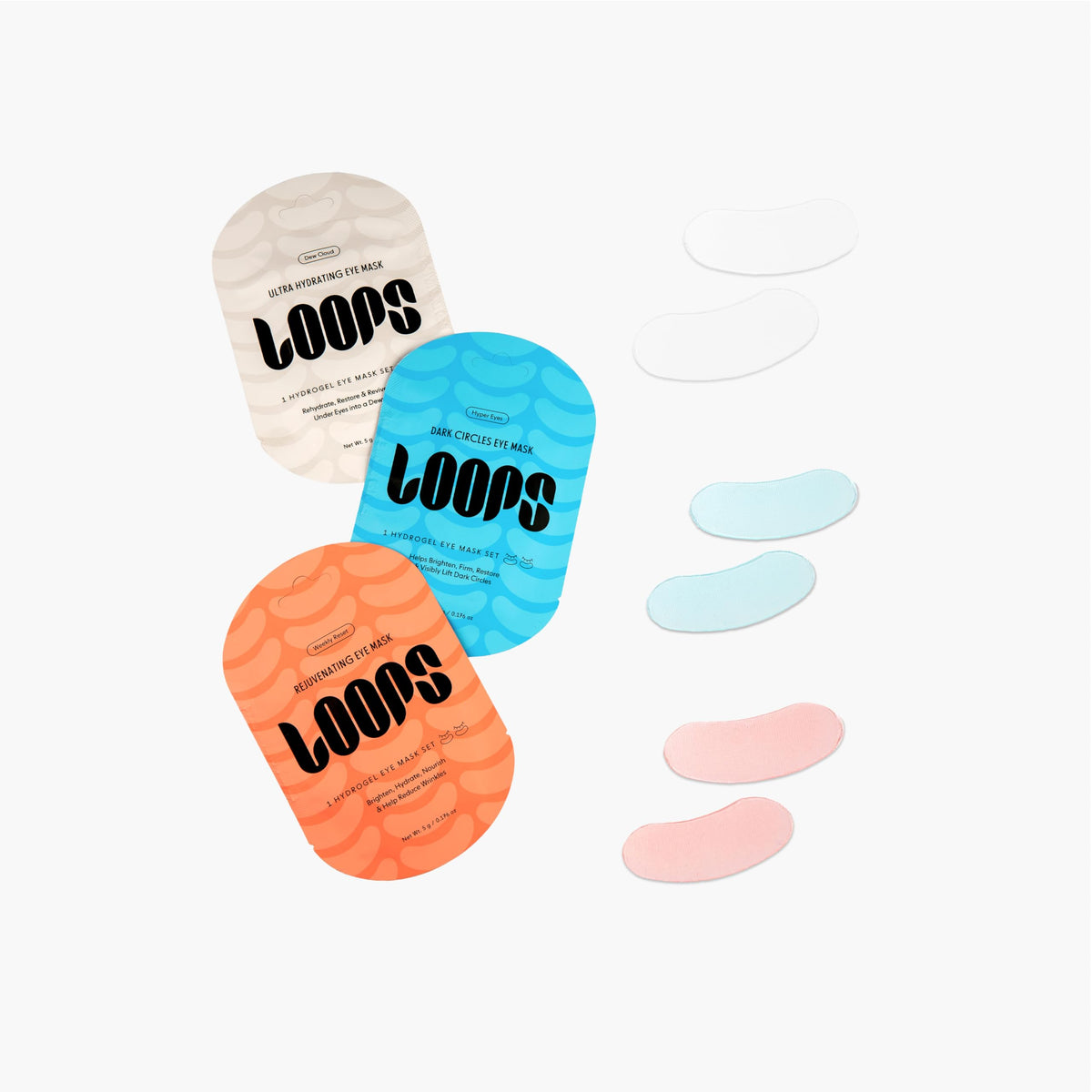 LOOPS trio next to a hand for size comparison and easy use