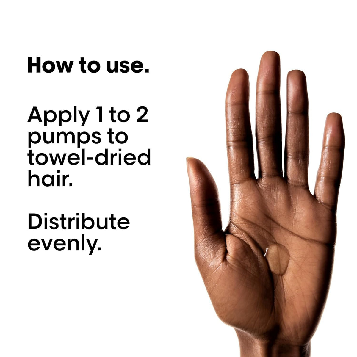 L'Oréal Professionnel Paris oil in hand to show size and easy application