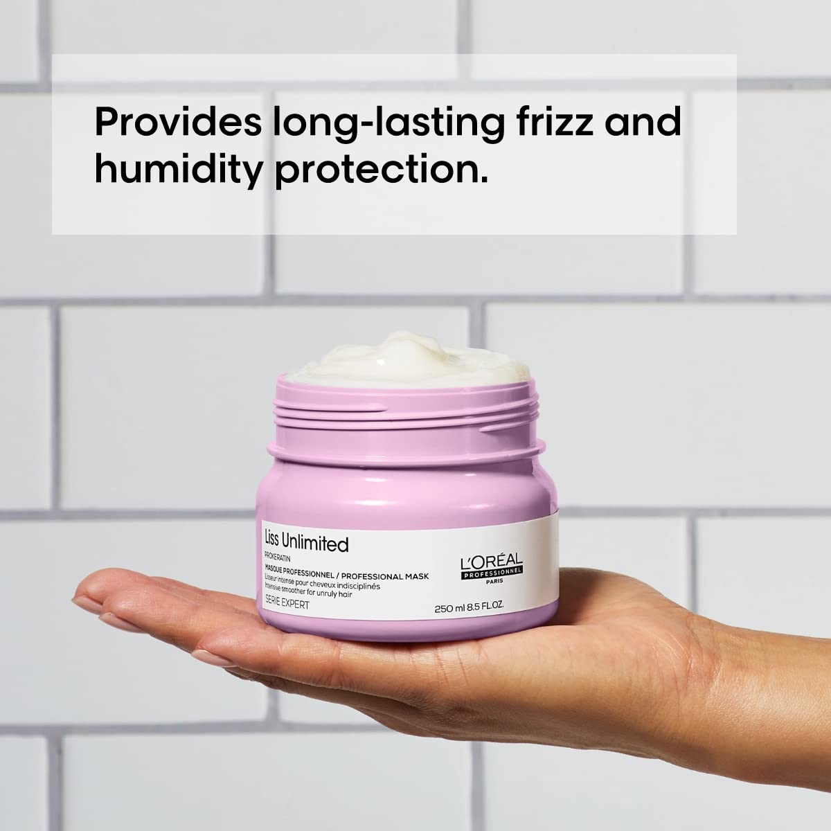 L'Oréal Professionnel open jar with spoon indicating easy scoop and application