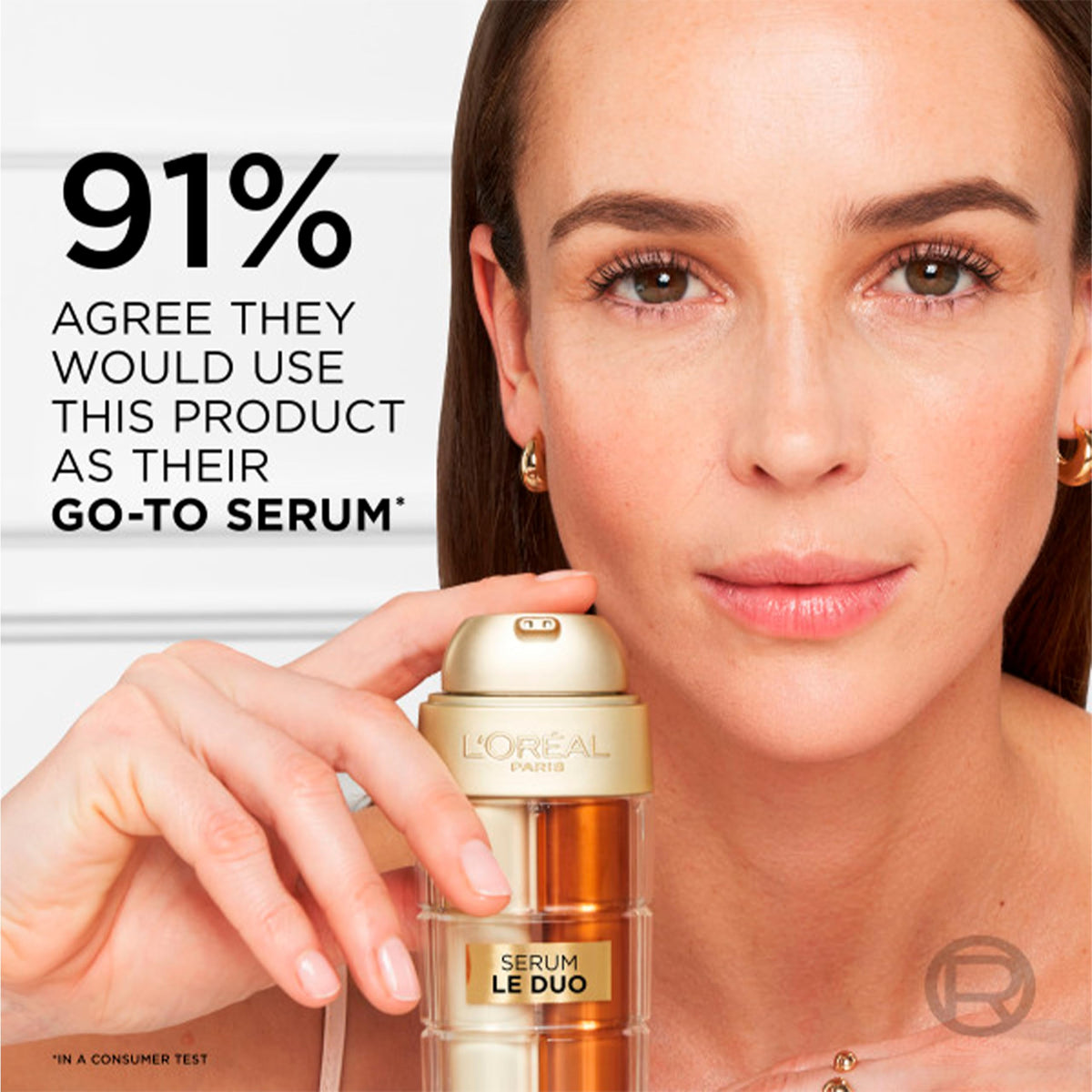 L'Oreal Paris close-up of dual chamber showing separated serum phases for freshness