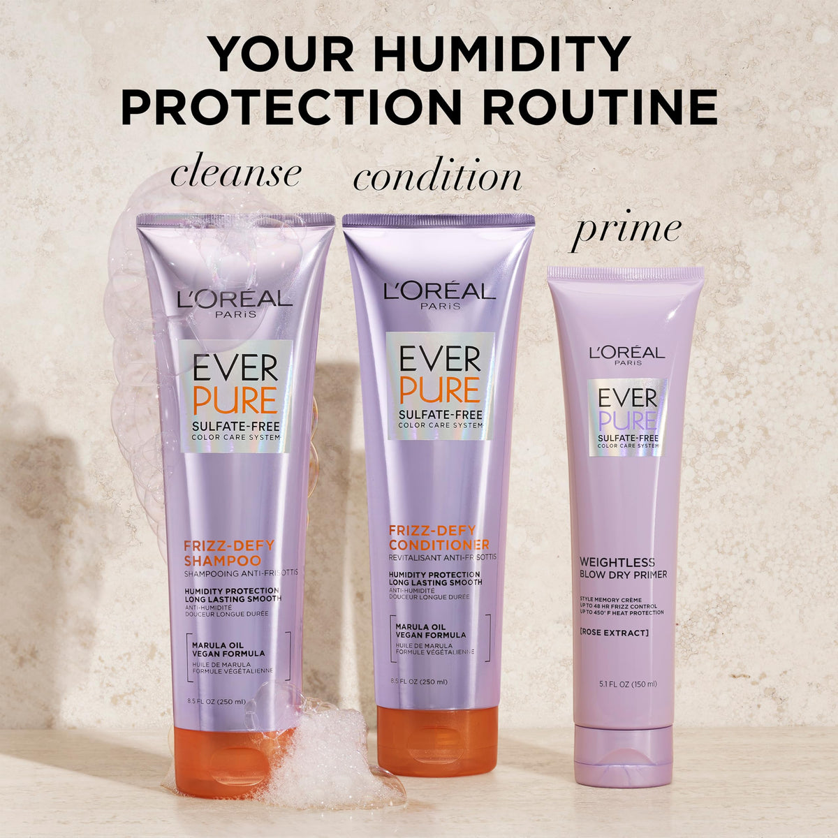 L'Oreal Paris conditioner being applied mid-lengths for detangling benefit