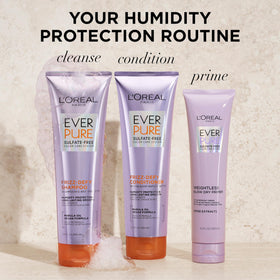 L'Oreal Paris conditioner being applied mid-lengths for detangling benefit