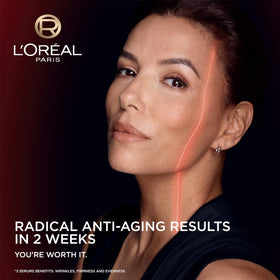 L'Oreal Paris dropper dispensing a drop to show controlled application and precise dosing