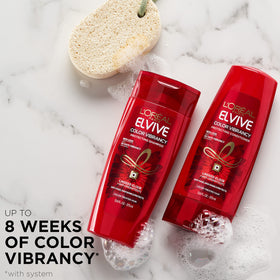 L'Oreal Paris dispensing shampoo texture demonstrating nourishing foam benefit
