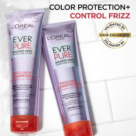 L'Oreal Paris conditioner applied to wet hair demonstrating frizz control