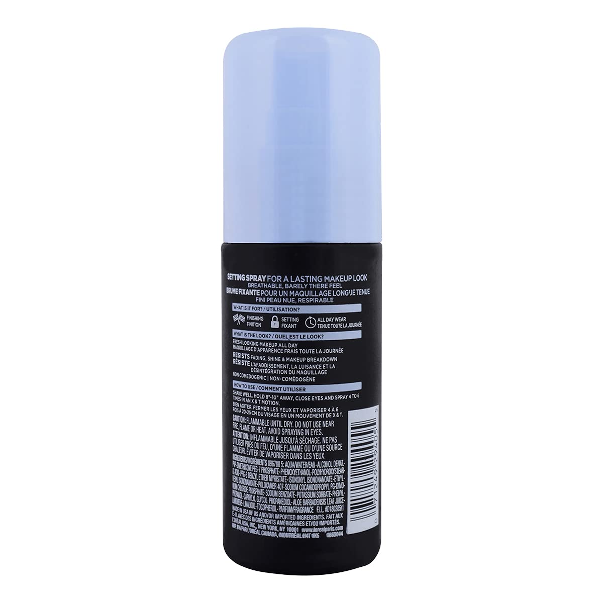 L'Oreal Paris spray held in hand to show 3.4 ounce size and portability