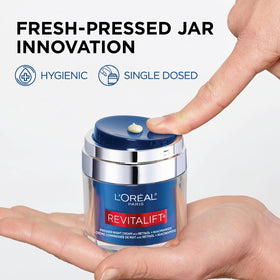 L'Oreal Paris label close-up highlighting retinol and niacinamide benefits