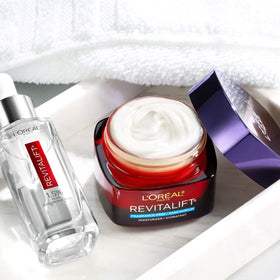 L'Oreal Paris products on bathroom shelf illustrating daily skincare routine