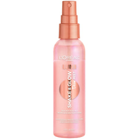 L'Oreal Paris lifestyle image spraying mist onto face to refresh makeup and hydrate